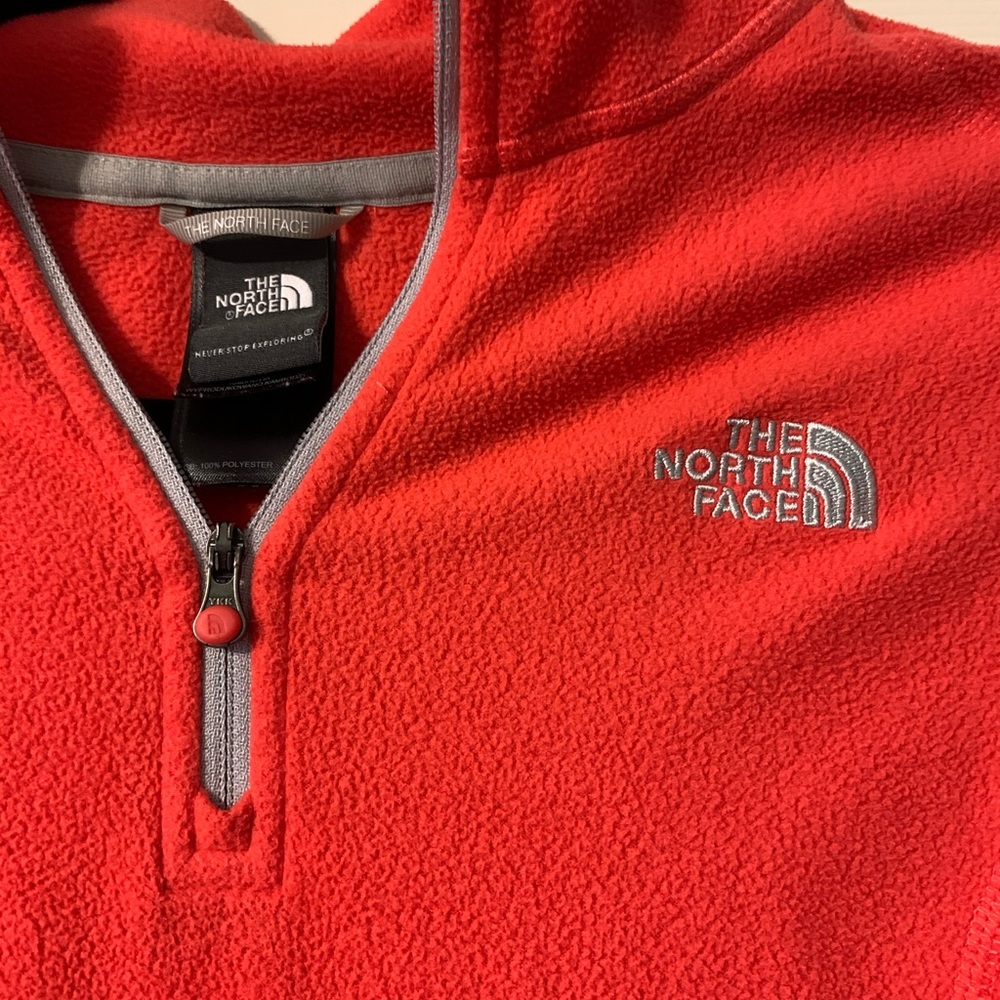 orange north face 1/4 zip